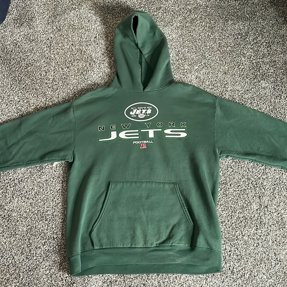 Official NFL NY Jets hoodie. No size listed but definitely small.